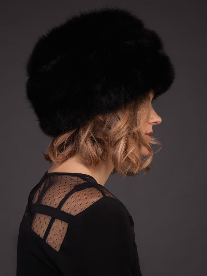 Black fox fur hat with leather inserts and flat top
