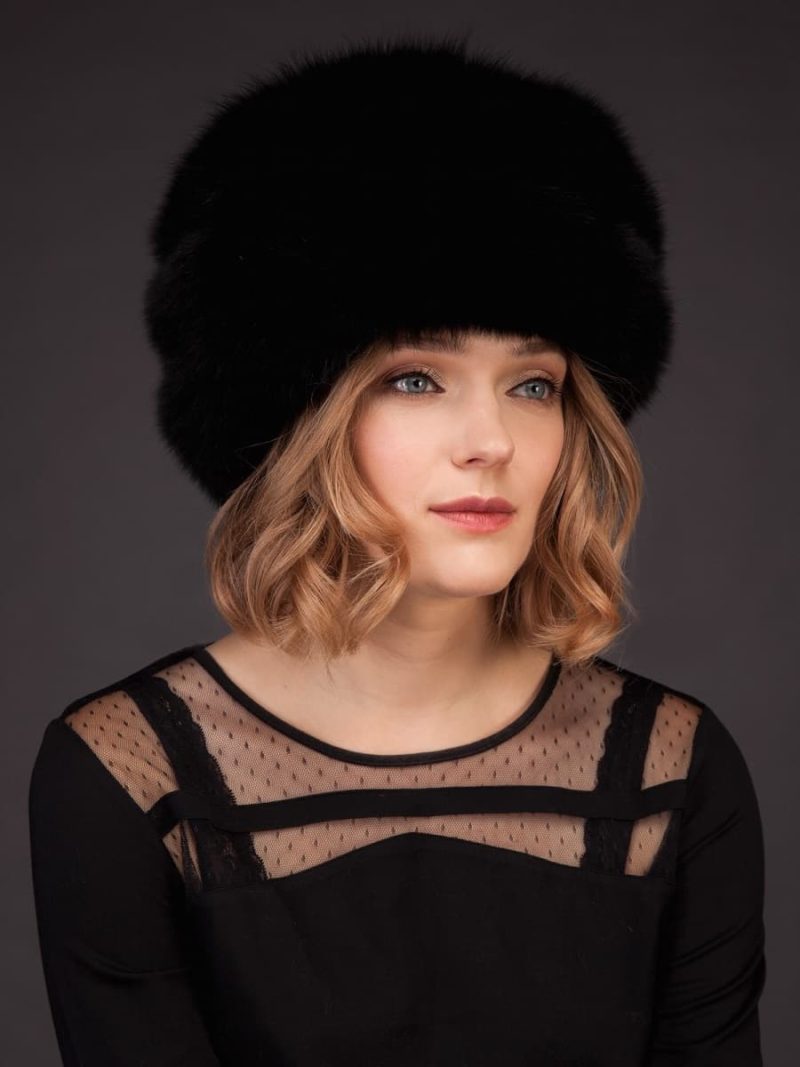 Black fox fur hat with leather inserts and flat top