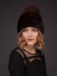Dark brown mink fur hat with leather inserts and fox fur pom pom