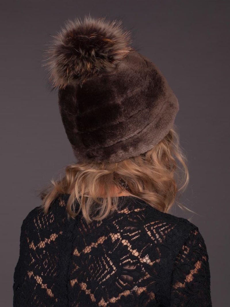 Natural sheared brown beaver fur hat with fox pom-pom