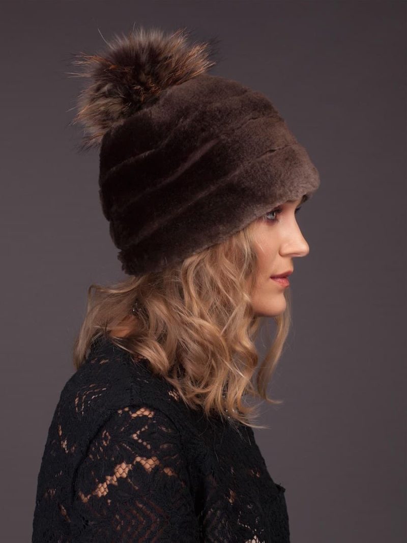 Natural sheared brown beaver fur hat with fox pom-pom