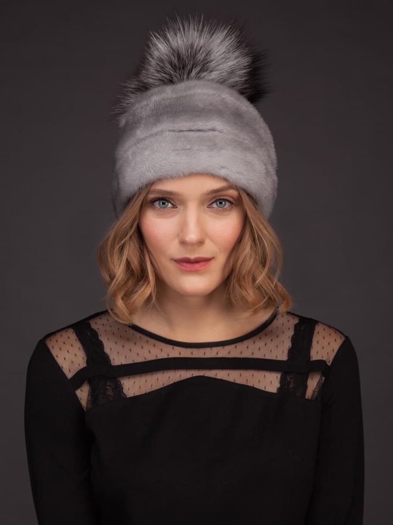 Natural sapphire mink fur hat with leather inserts and fox fur pom pom