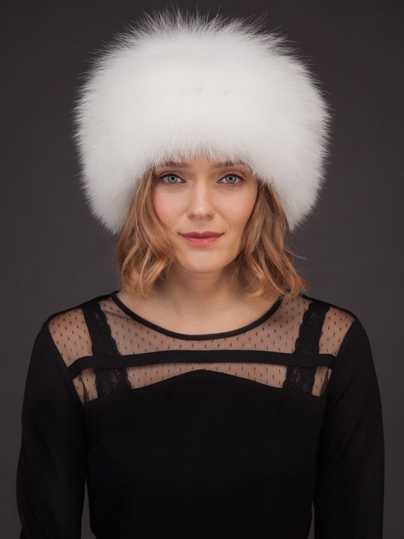 White fox fur hat with leather inserts and flat top