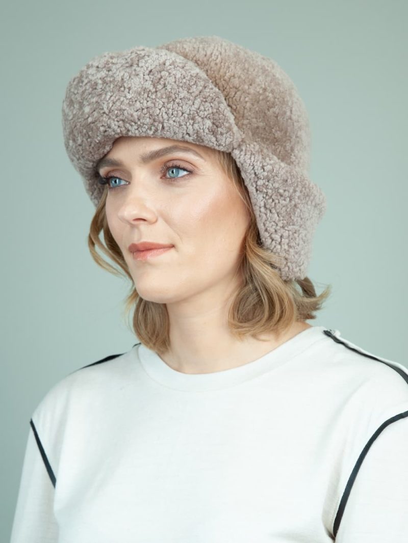 beige sheepskin trapper fur hat with ear flaps for women