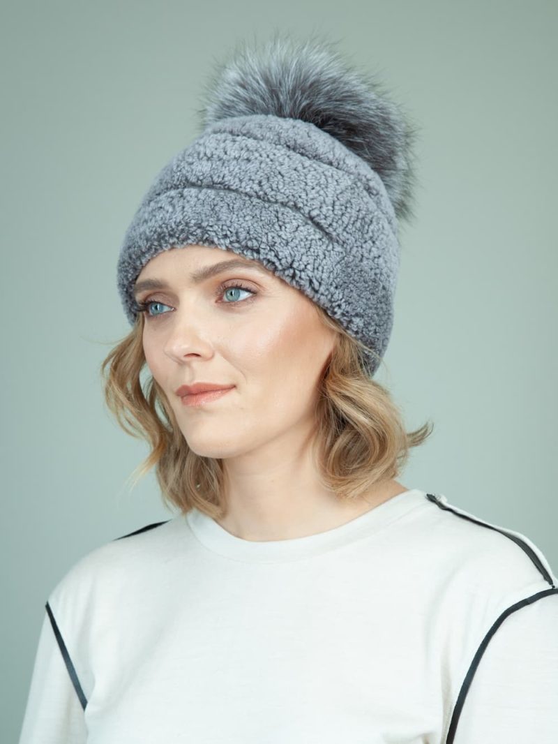blue sheepskin fur hat with fox pom pom for women