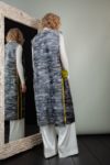 gray astrakhan karakul fur vest with yellow chinchilla pocket decoration
