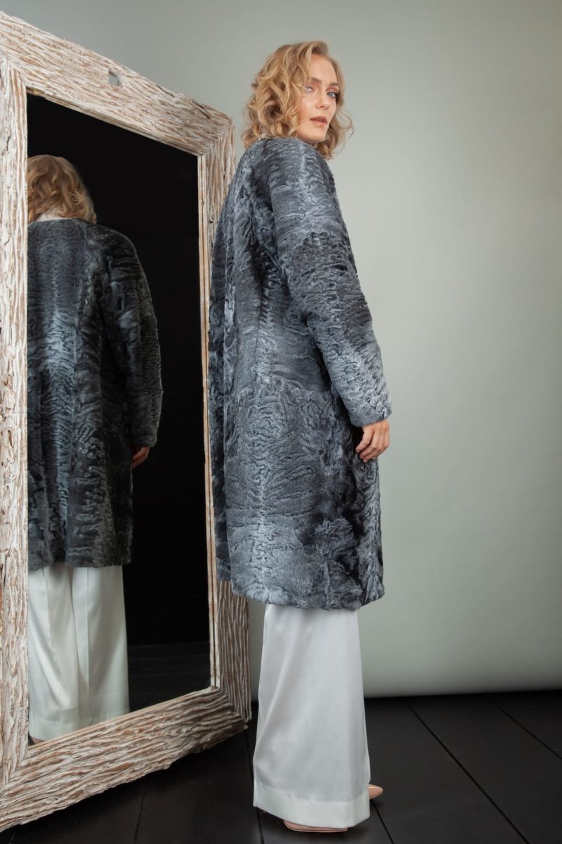 medium-length gray astrakhan karakul fur coat with detachable fox collar