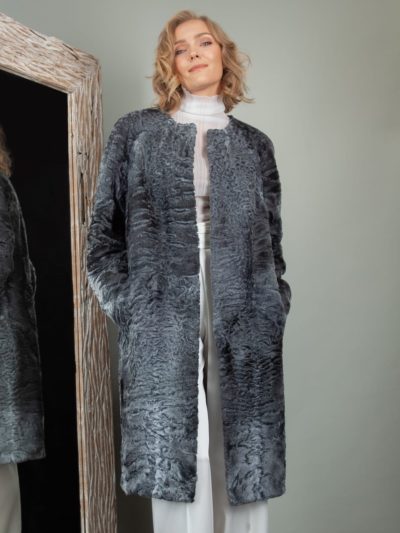 medium-length gray astrakhan karakul fur coat with detachable fox collar