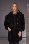 black mouton jacket with fox fur sleeves