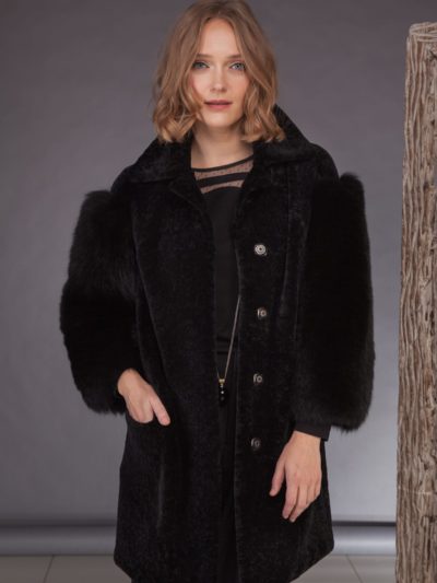 black mouton jacket with fox fur sleeves