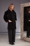 black mouton jacket with fox fur sleeves