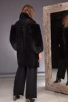 black mouton jacket with fox fur sleeves