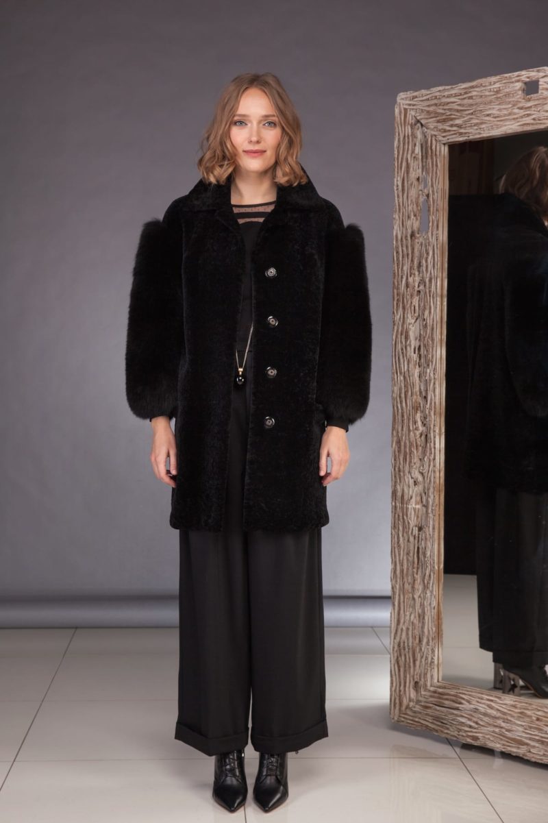 black mouton jacket with fox fur sleeves