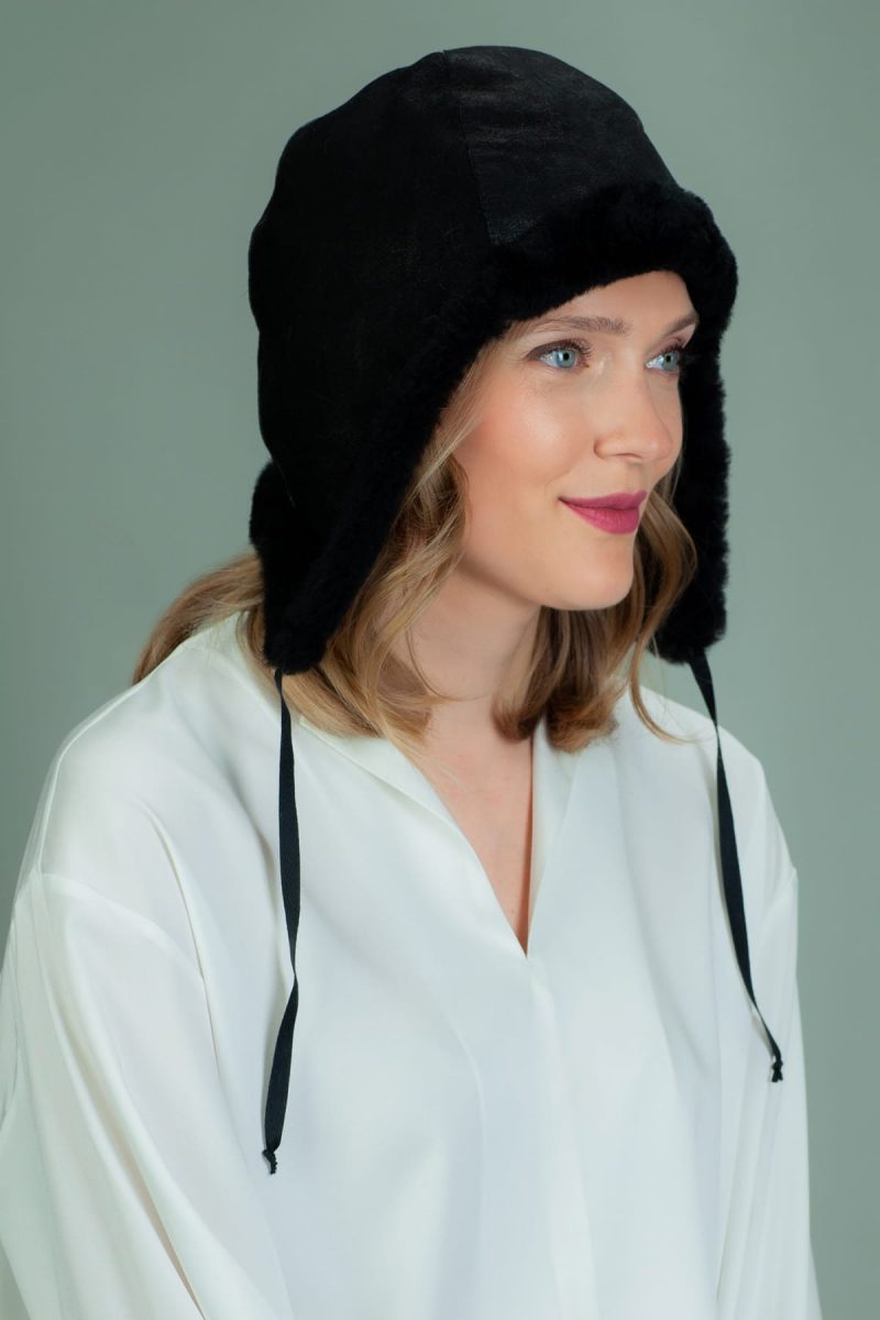 black fur-lined sheepskin helmet hat