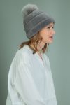 gray sheepskin hat with fox fur pom-pom