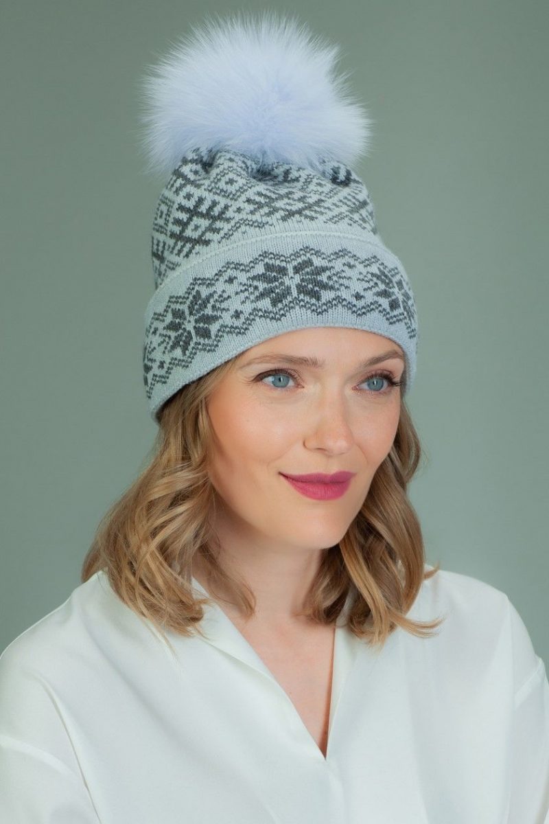knit wool hat with fur pom-pom in gray star pattern