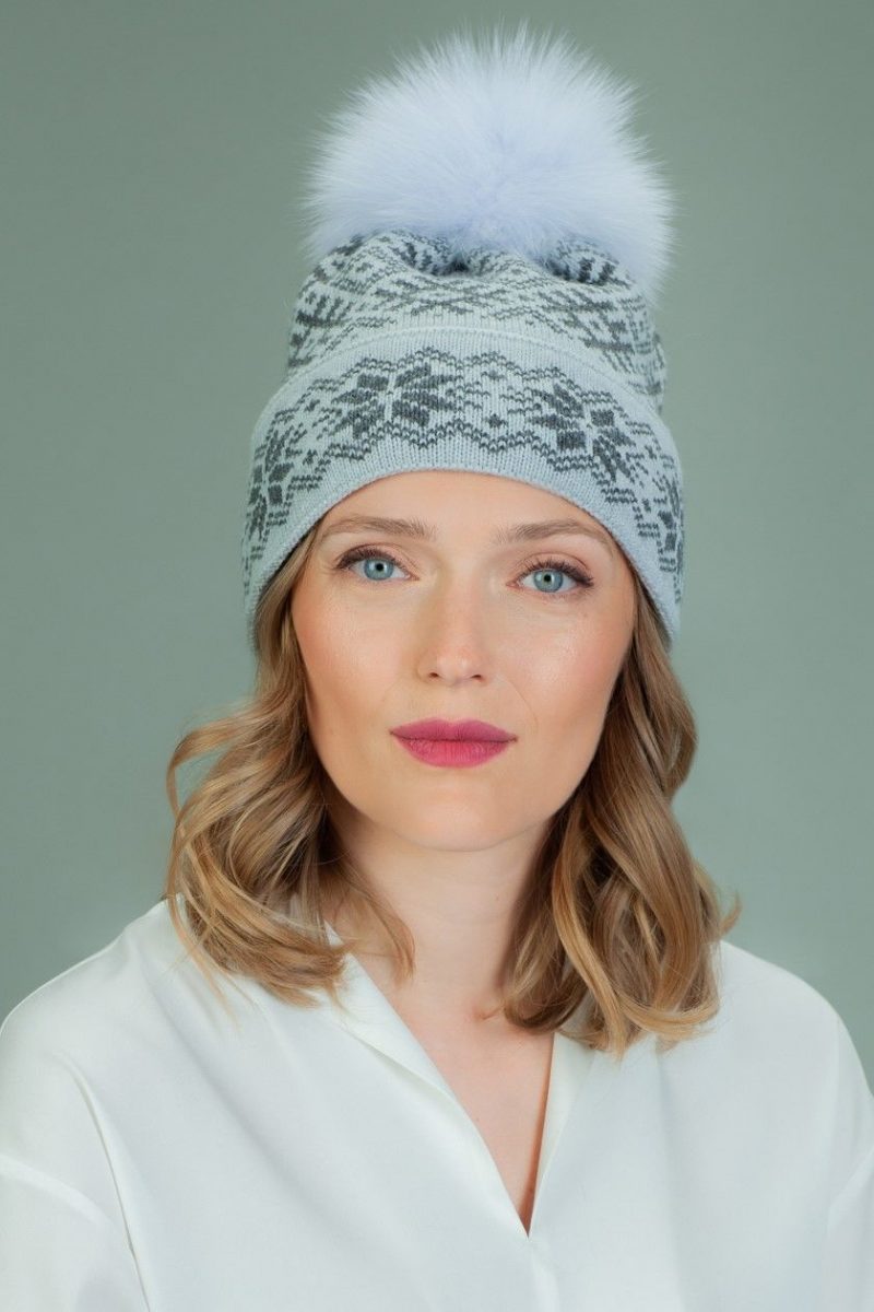 knit wool hat with fur pom-pom in gray star pattern