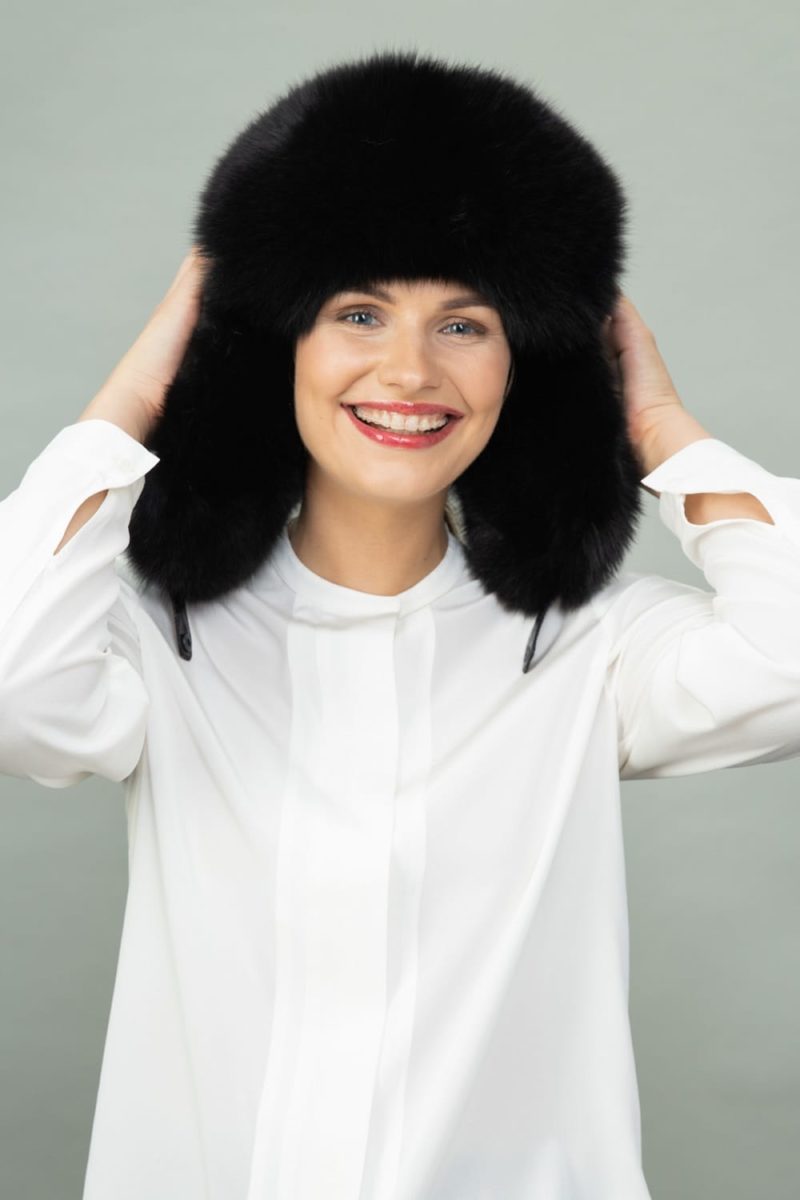 black fox fur and puffy hat with ear flaps