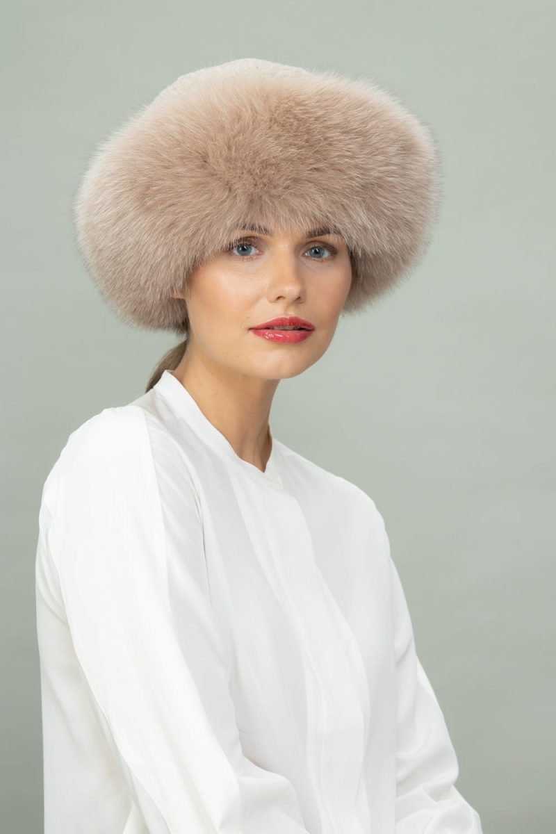 brown fox fur and beige sheepskin hat
