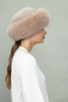 brown fox fur and beige sheepskin hat