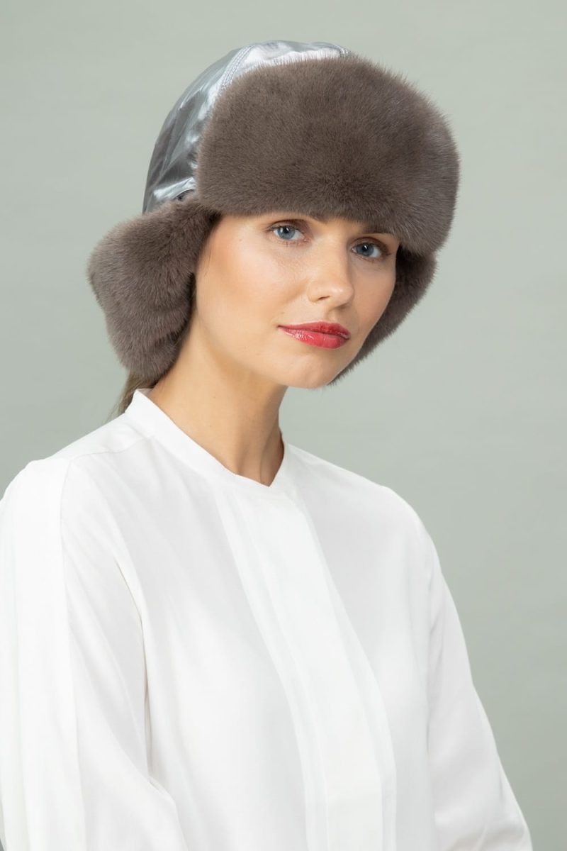 brown mink fur and silver puffy hat with ear flaps