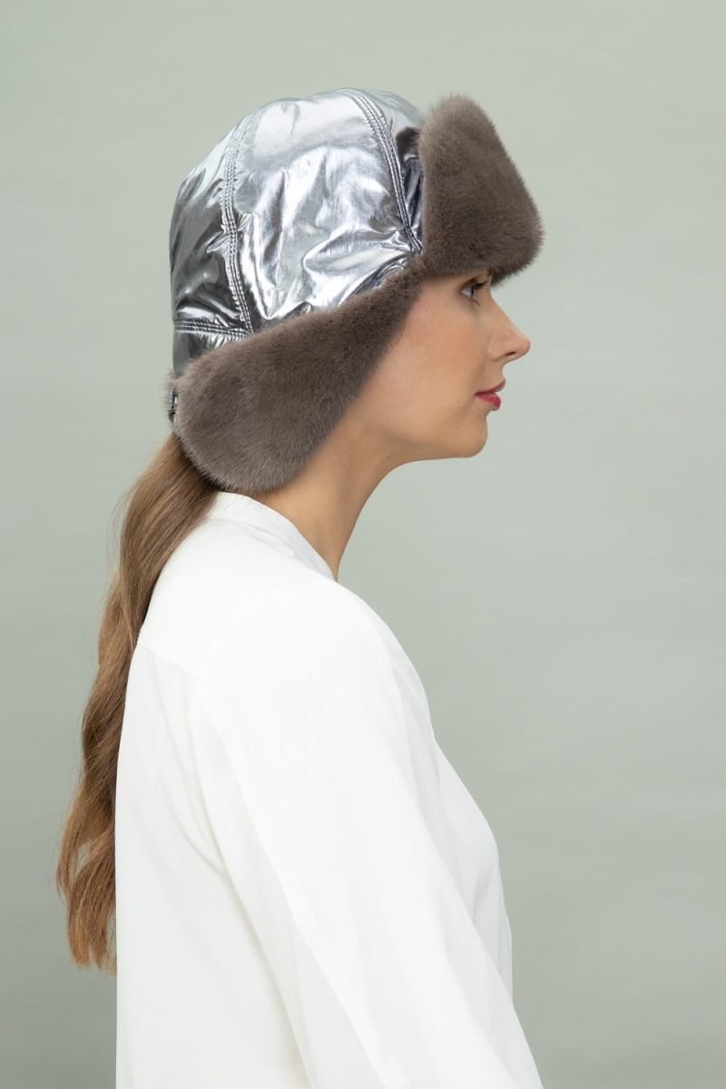 brown mink fur and silver puffy hat with ear flaps