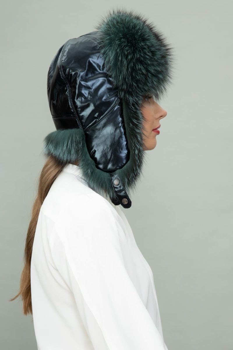 green fox fur and puffy hat with ear flaps