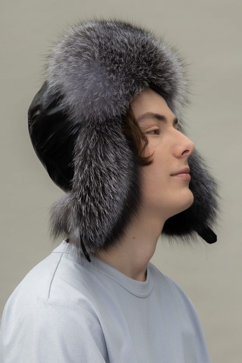 silver fox fur and black puffy padding hat with ear flaps
